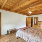 absolute auction by NashvilleAuctions at 140 Captain Bell Lane, Gallatin, TN 37066 bedroom with wood ceiling