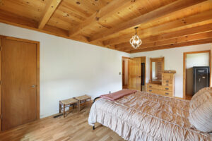 absolute auction by NashvilleAuctions at 140 Captain Bell Lane, Gallatin, TN 37066 bedroom with wood ceiling