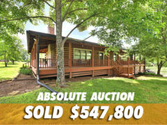 ABSOLUTE AUCTION FOR A BEAUTIFUL LOG CABIN ON 5 ACRES