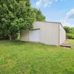 Outside building on 5 acres with beautiful log cabin
