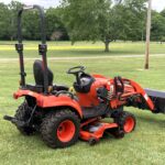 Side view Tractor Personal Property at live-onsite auction