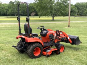 Side view Tractor Personal Property at live-onsite auction