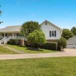 Front of home absolute auction by NashvilleAuctions