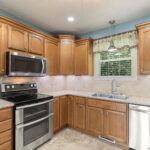 Kitchen with tile backsplash