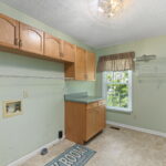 Laundry Room with build in shelving