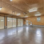 Detached three car garage with open floor plan