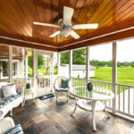 covered back porch with ceiling fan