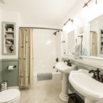 bathroom with two sinks for lakefront property